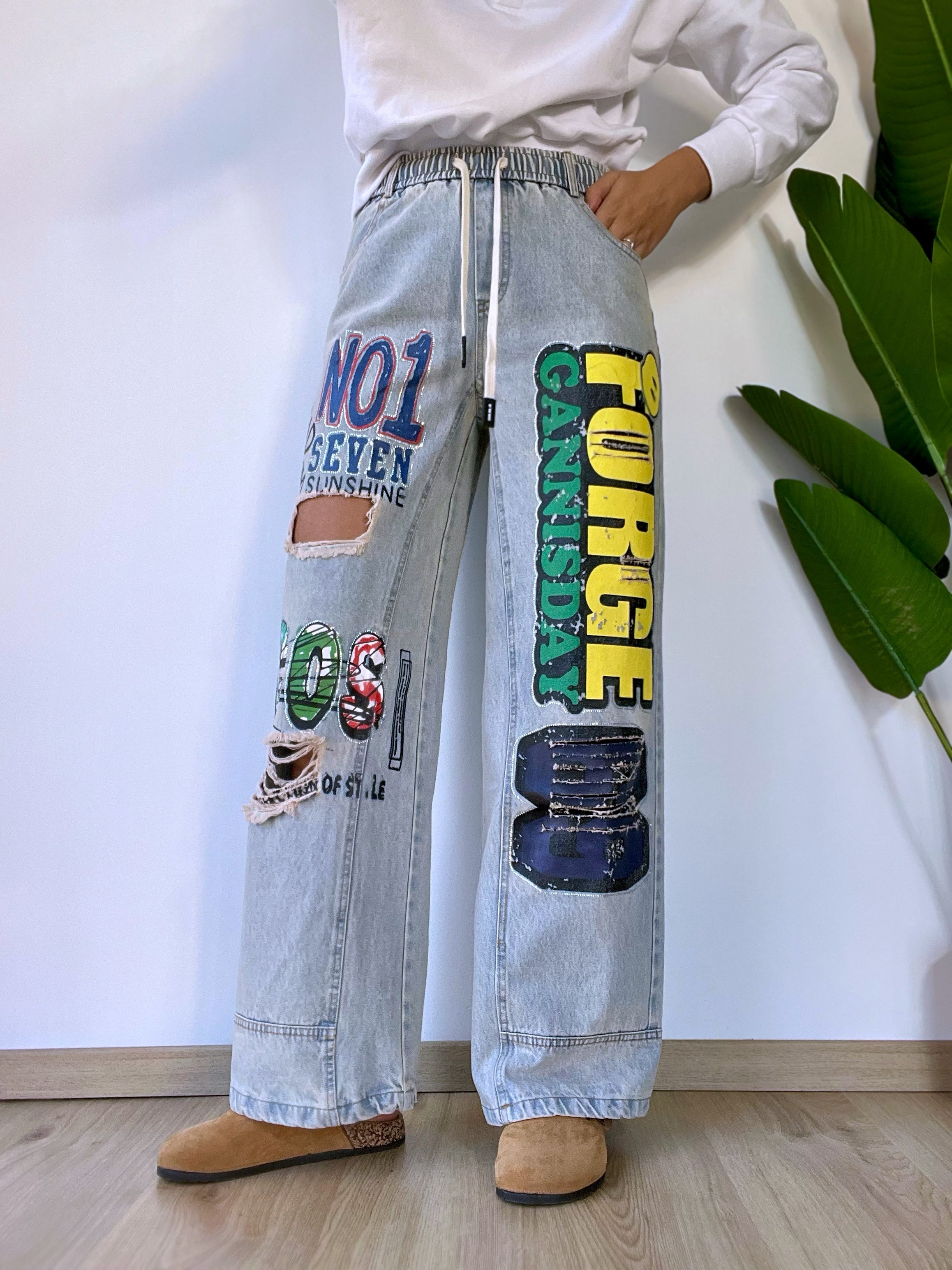 Jeans palazzo graffiti